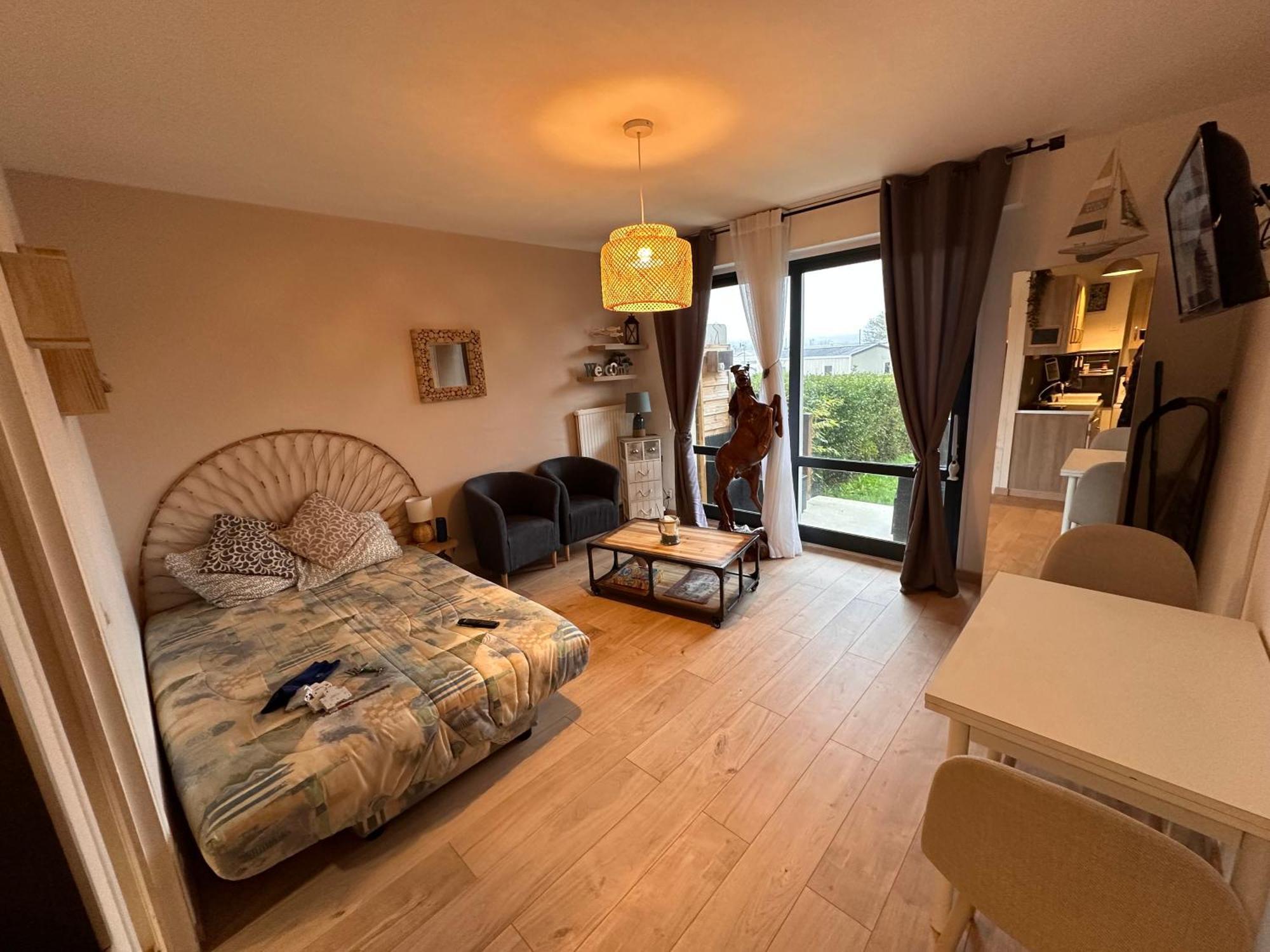 Appartement Avec Rez-de-jardin Bord De